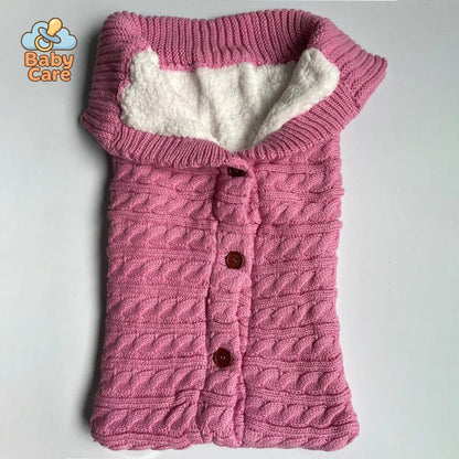 Nid d'ange bébé tricot à boutons