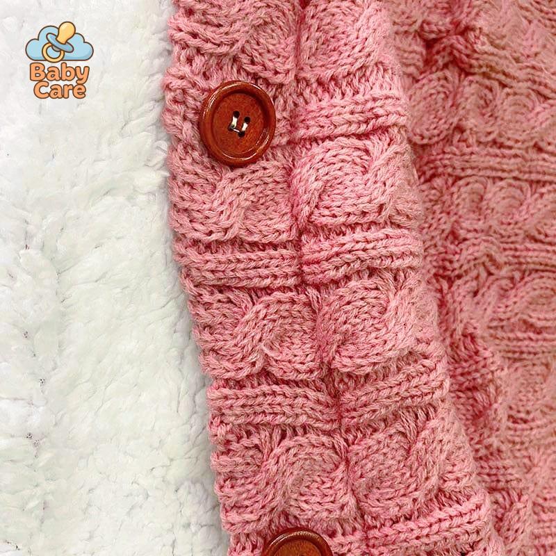 Nid d'ange bébé tricot à boutons
