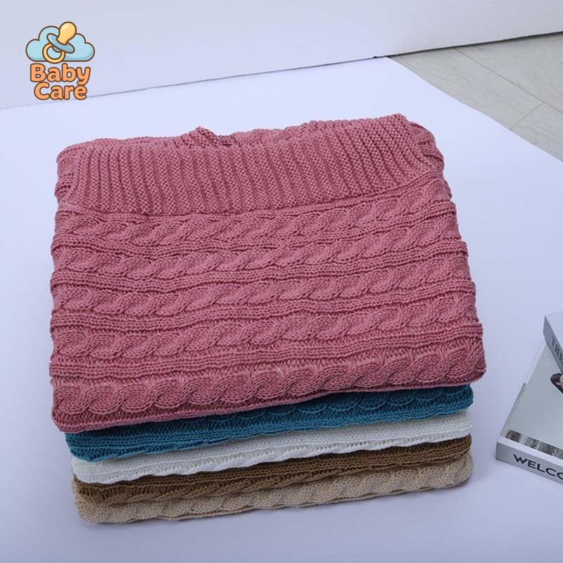 Nid d'ange bébé tricot à boutons